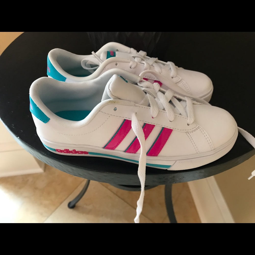 Never worn girl Adidas sneakers
